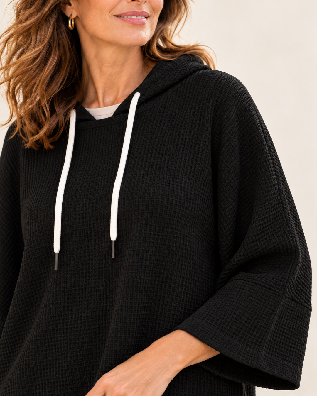 Oriana™ | Poncho in maglia con cappuccio